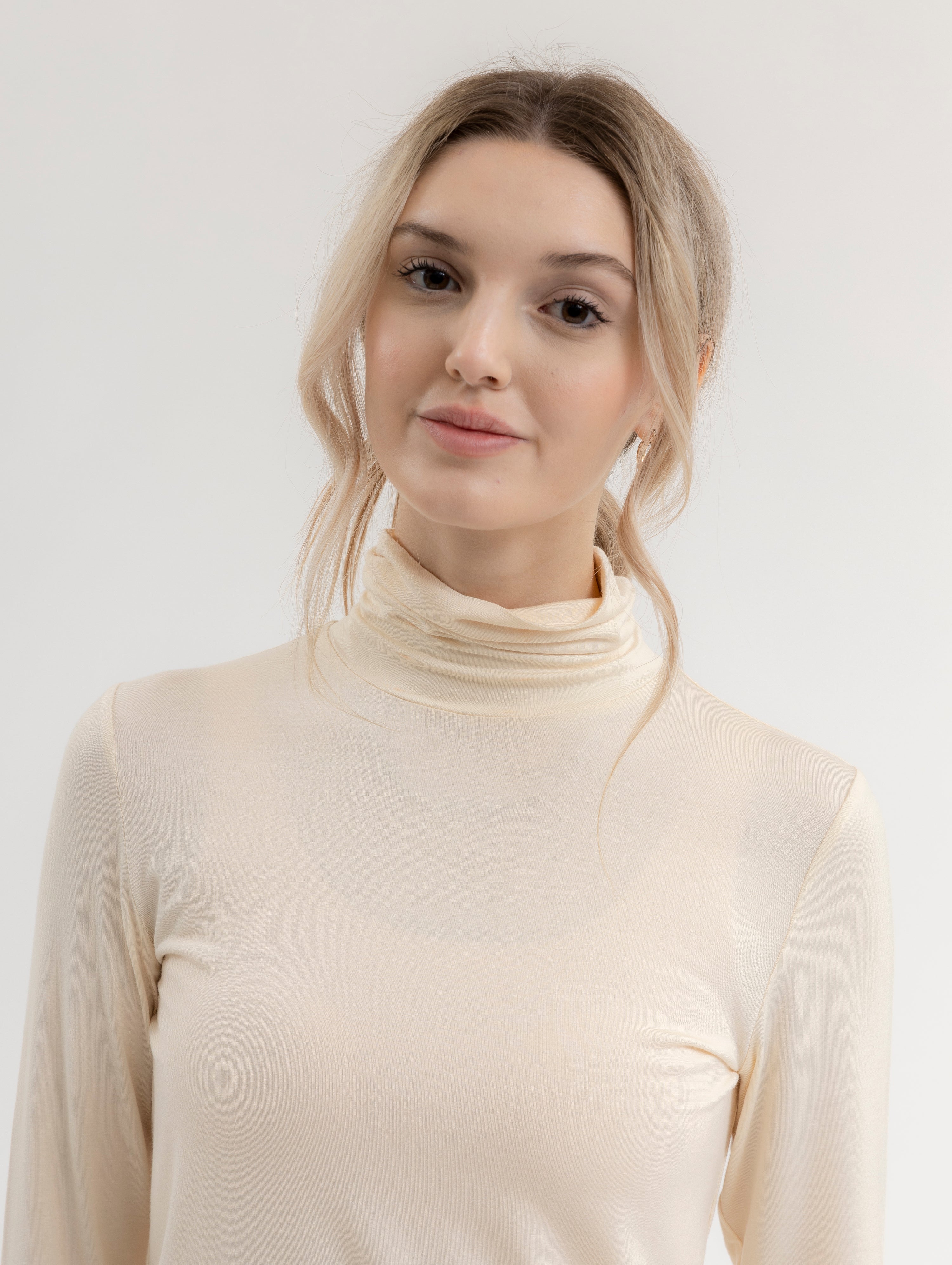 Beige turtleneck top best sale